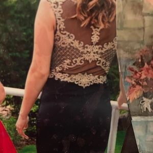 Long black dress with gold sequin and mesh detailing. Very flattering